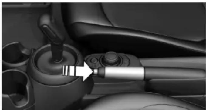 Close-up of a car gear shift lever mechanism (no text or symbols visible)
