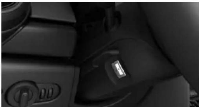 Close-up of a car interior showing a car's headrest and control panel (no visible text or symbols)