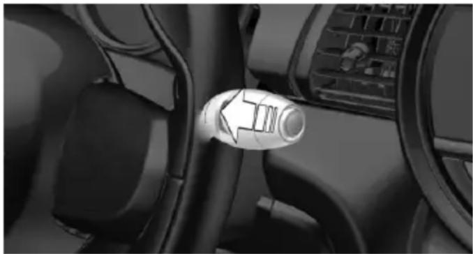 Interior view of a car showing the wheel and seatbelt with a white connector (no visible text or symbols)