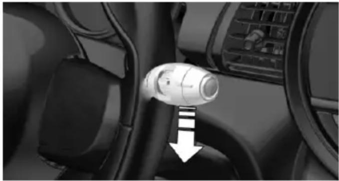 Interior view of a car showing a car seatbelt with a white arrow pointing to a component (no text or symbols visible)