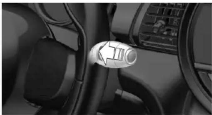 Interior view of a car showing the wheel and seatbelt (no visible text or symbols)