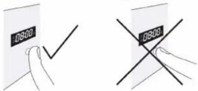 Diagram showing two hand-drawn checkmark and cross symbols on a document, indicating status or modification.