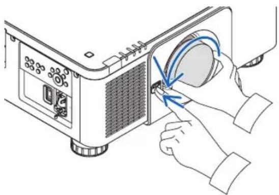 SHARP PX1004UL - While pressing the LENS release button on the projector's front panel fully in, turn the lens counterclockwise. - 1