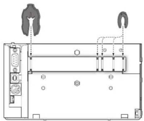Technical diagram of a device rear panel with labeled components and directional arrows indicating flow or movement.