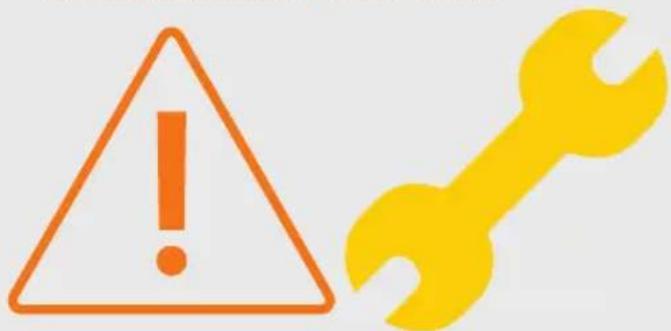 Warning symbol with orange exclamation mark and yellow wrench icon