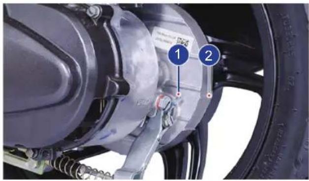 Close-up mechanical assembly diagram with numbered components and labels