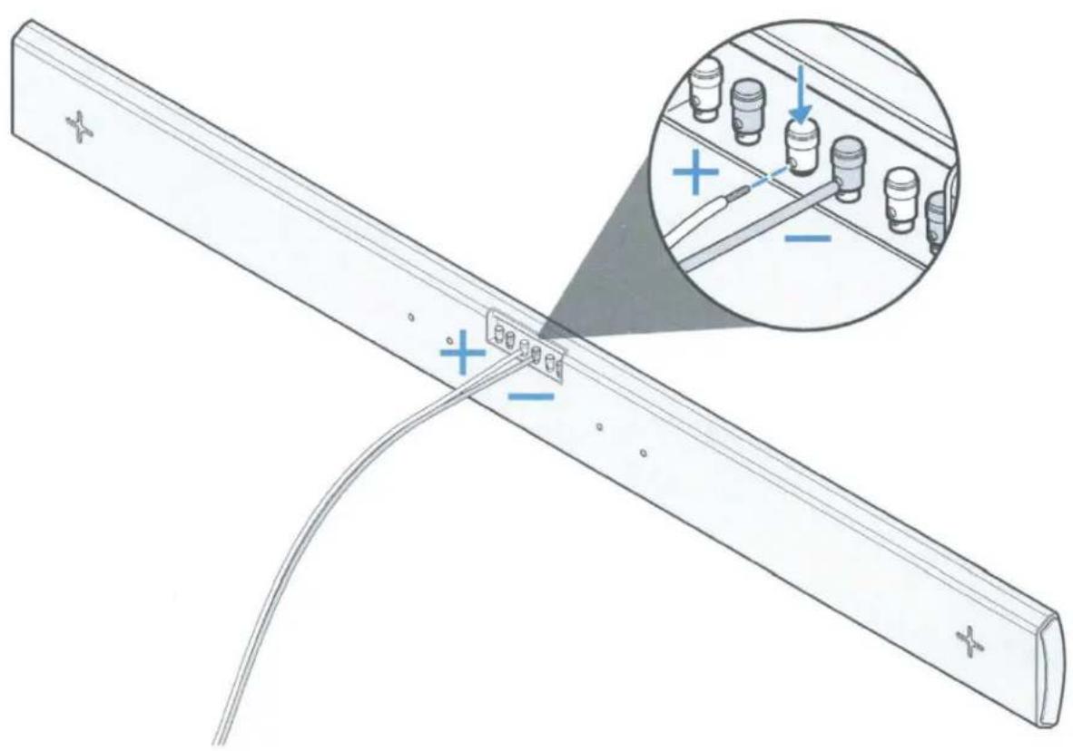 Technical diagram showing a metal rod with labeled terminals and a magnified inset of its internal components, likely illustrating a mechanical or electrical assembly.