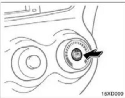 Diagram of a car interior with concentric circular patterns and a central circular component, no text or symbols present.