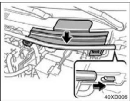 Mechanical assembly diagram showing a component with arrows indicating motion or movement, no readable text or symbols present.