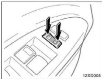 Diagram of a vehicle interior with two sensors mounted on a vehicle chassis (no text or symbols)