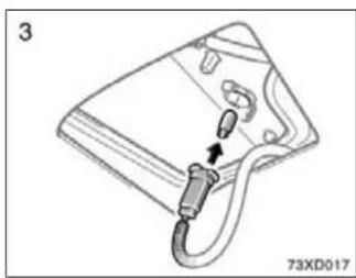 Technical line drawing of a mechanical device with a cable and connector (no text or symbols)