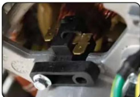 DuroMax XP7500DX - Remove bolt from brush - 1