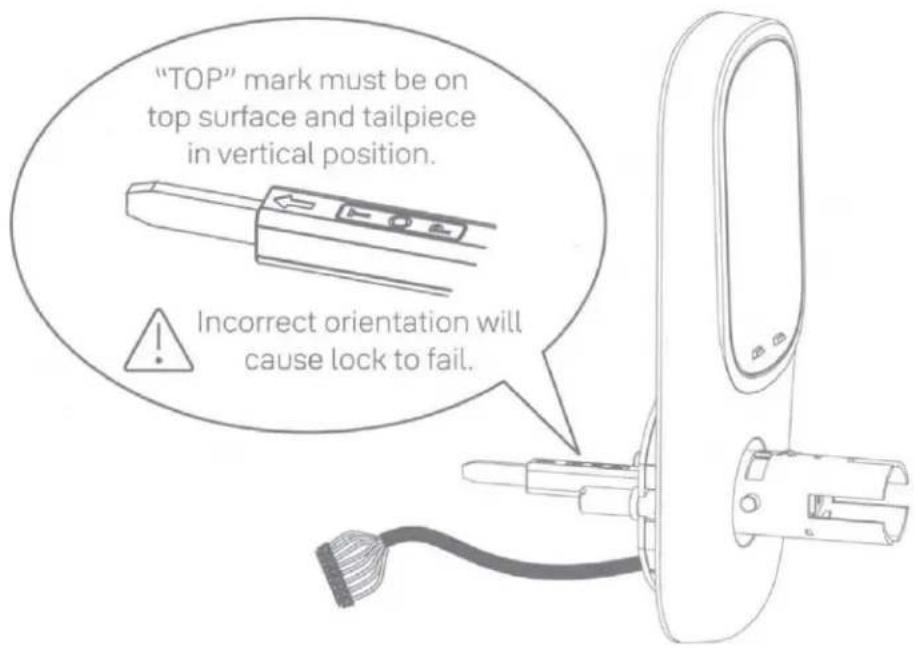 "TOP" mark must be on top surface and tailpiece in vertical position. Incorrect orientation will cause lock to fail.