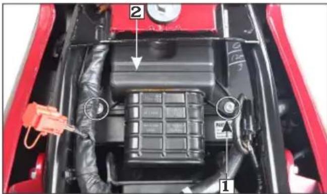 Labeled diagram of a car engine showing components including battery, valve, and wiring with numbered annotations