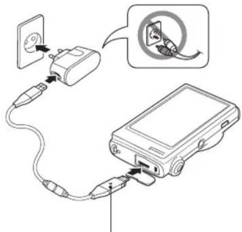 Diagram showing connections between a power outlet, plug-in socket, and connected device with a warning symbol