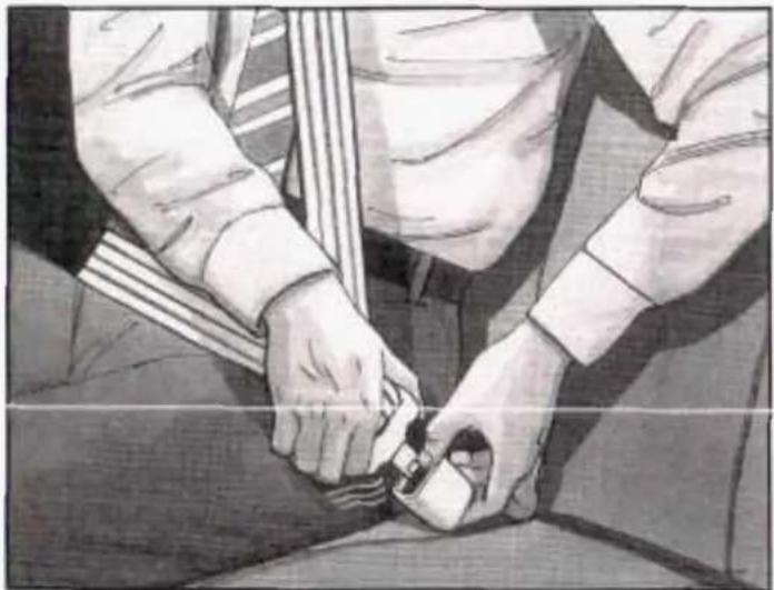 Illustration of two hands adjusting a small object, possibly a seatbelt or connector (no text or symbols visible)