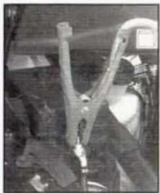 Close-up of a person wearing a safety harness and helmet, with no visible text or symbols