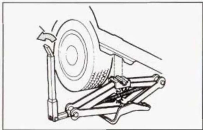Technical line drawing of a mechanical assembly with a wheel and spring mechanism (no text or symbols)