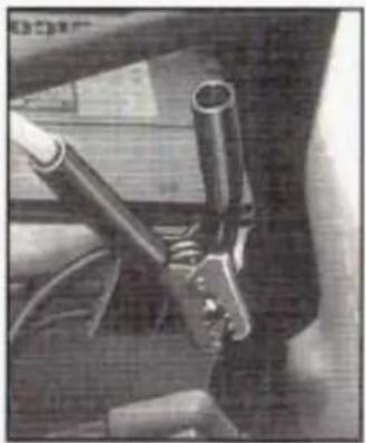 Close-up of a mechanical component with visible pipes and brackets (no text or symbols)