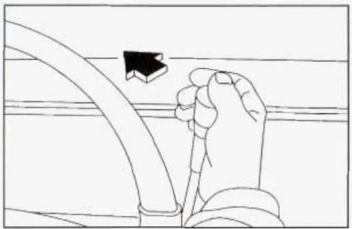 Line drawing of a hand holding a cable with a black arrow pointing upward (no text or symbols)
