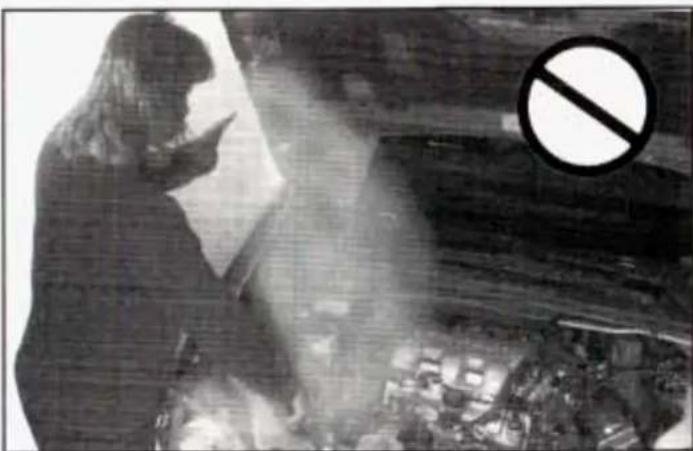 Black-and-white photo of a person reading a book with a large 'no' symbol overlay, no readable text or symbols present.
