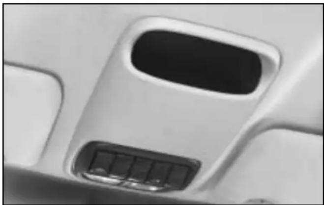 Close-up of a white airplane fuselage with a black vent and control panel (no text or symbols visible)
