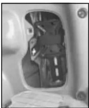 Interior view of a vehicle showing the intake manifold and dashboard (no visible text or symbols)