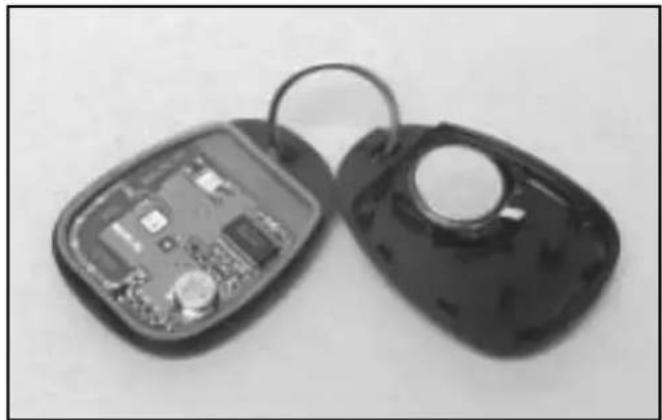Two black keys with open and closed views showing internal electronic components (no text or symbols visible)