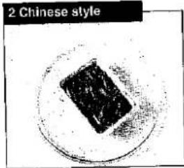 Black rectangular object on a circular surface, labeled '2 Chinese style' in top-left corner (no other text or symbols).
