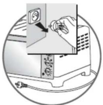 Illustration of a hand inserting a plug into a computer monitor (no text or symbols visible)