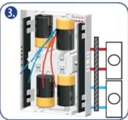 Diagram showing electrical connections with labeled components and wiring paths, including a grid connection and two circular symbols.