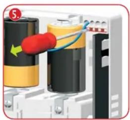 Close-up of a battery assembly with red and yellow components, no visible text or symbols