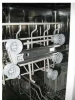 Industrial machinery setup with rollers and metal frame (no visible text or symbols)