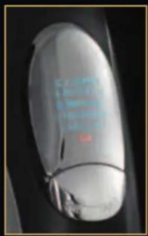 Close-up of a transparent, oval-shaped object with glossy surface and small protrusions (no visible text or symbols)