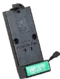 Electronic component with visible label and green logo, likely a circuit breaker or terminal block