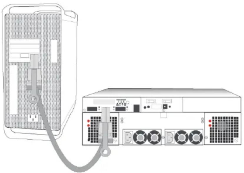 Diagram of a desktop computer tower connected to an external network unit via cable (no text or labels visible)
