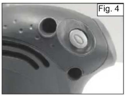 Close-up of a mechanical component with circular ports and a central knob, labeled 'Fig. 4' (no other text or symbols)
