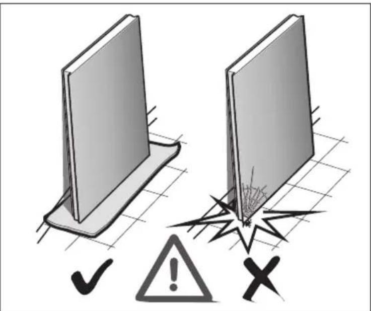 Safety warning illustration showing two panels with checkmark and warning symbols, one indicating failure or hazard.