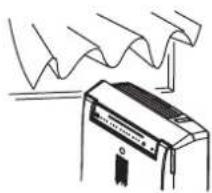 Line drawing of a washing machine with wavy lines above it (no text or symbols)