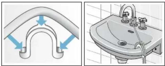 Technical illustration showing pipe fittings and a sink with tubing.