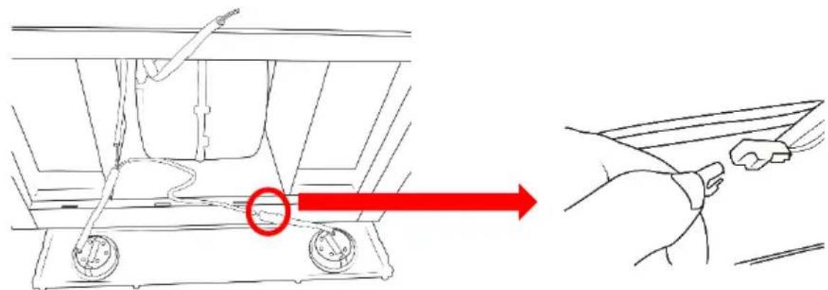 Diagram showing a hand holding a device with a red arrow indicating direction, highlighting a component with a circled circle.