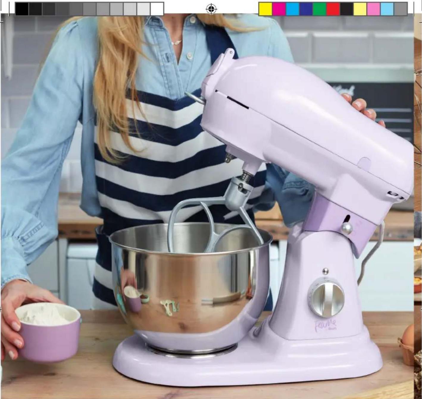 Woman preparing a purple K-199 kitchen mixer with flour, no visible text or symbols on the main subject.