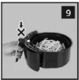 A hand holding a black air fryer with a pencil, lifting a piece of food (no text or symbols visible)