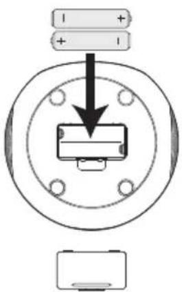 Diagram showing a mechanical or electrical component with labeled terminals and a downward arrow indicating direction.