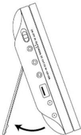 Technical diagram of a handheld device with labeled parts and an arrow indicating rotation or change.
