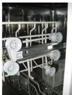 Industrial machinery setup with rollers and piping (no visible text or symbols)