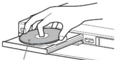 Illustration of a hand using a circular disc on a workbench, no text or symbols present