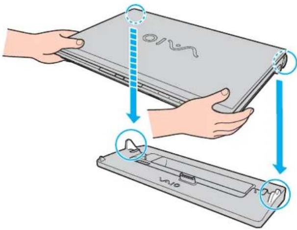 Diagram illustrating the process of removing a device from an open case, showing hand positioning and component insertion steps.