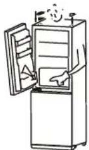 Line drawing of a refrigerator with open door and lid, showing interior shelves and a hand holding a tray (no text or symbols)