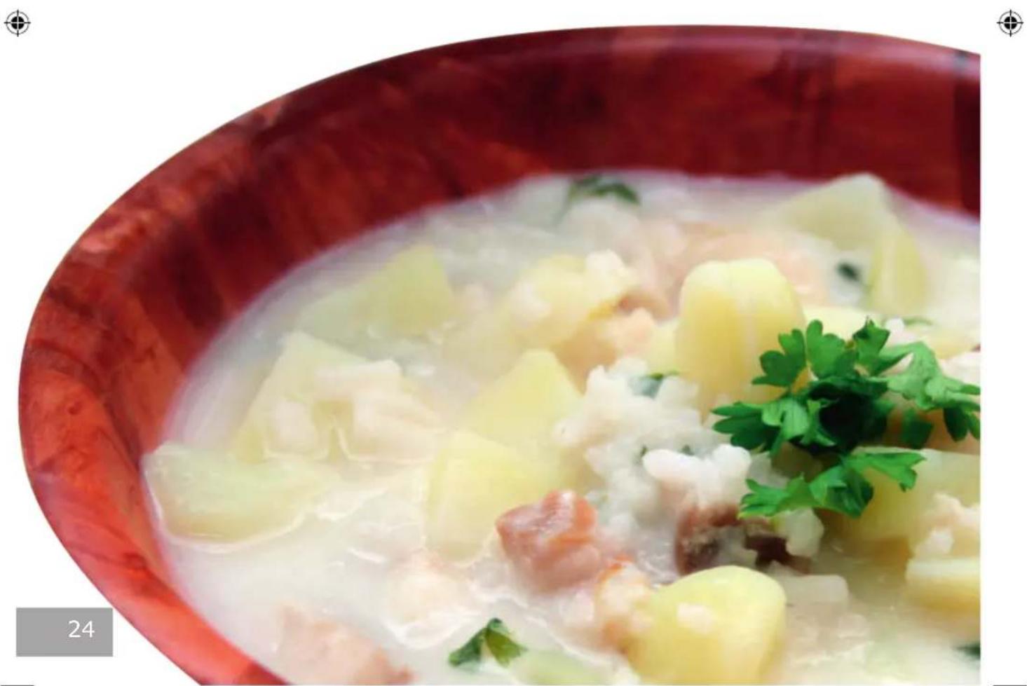 Close-up of a bowl of congee with diced potatoes, meat, and parsley garnish (no text or symbols visible)